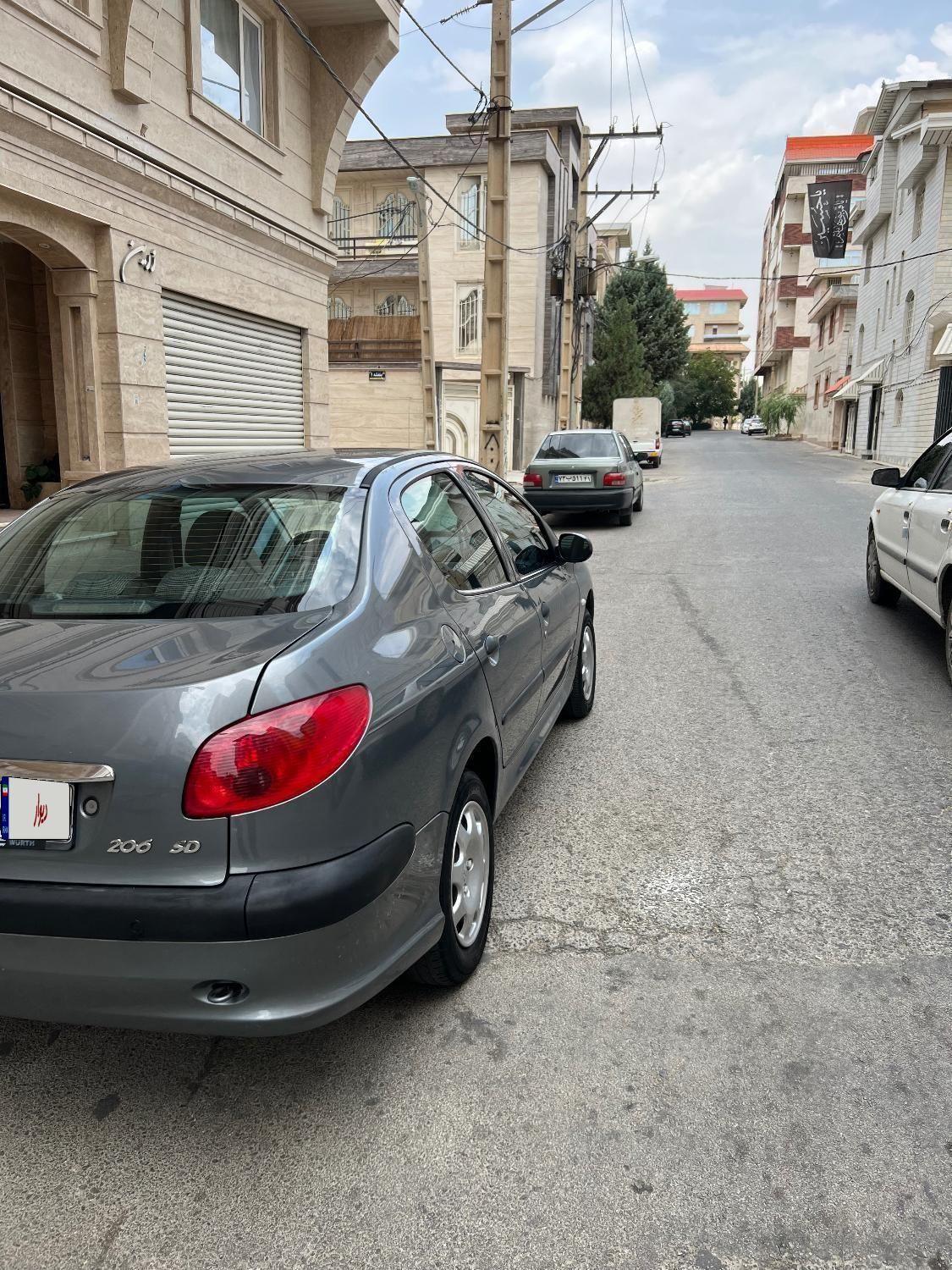 پژو ۲۰۶ صندوق دار v8 - 1397