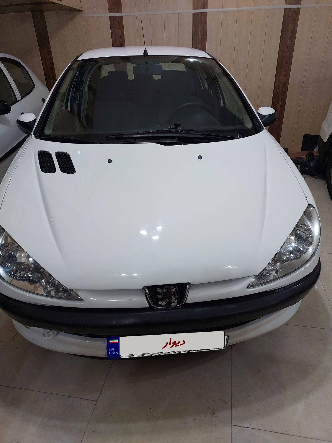 پژو ۲۰۶ صندوق دار v8 - 1391
