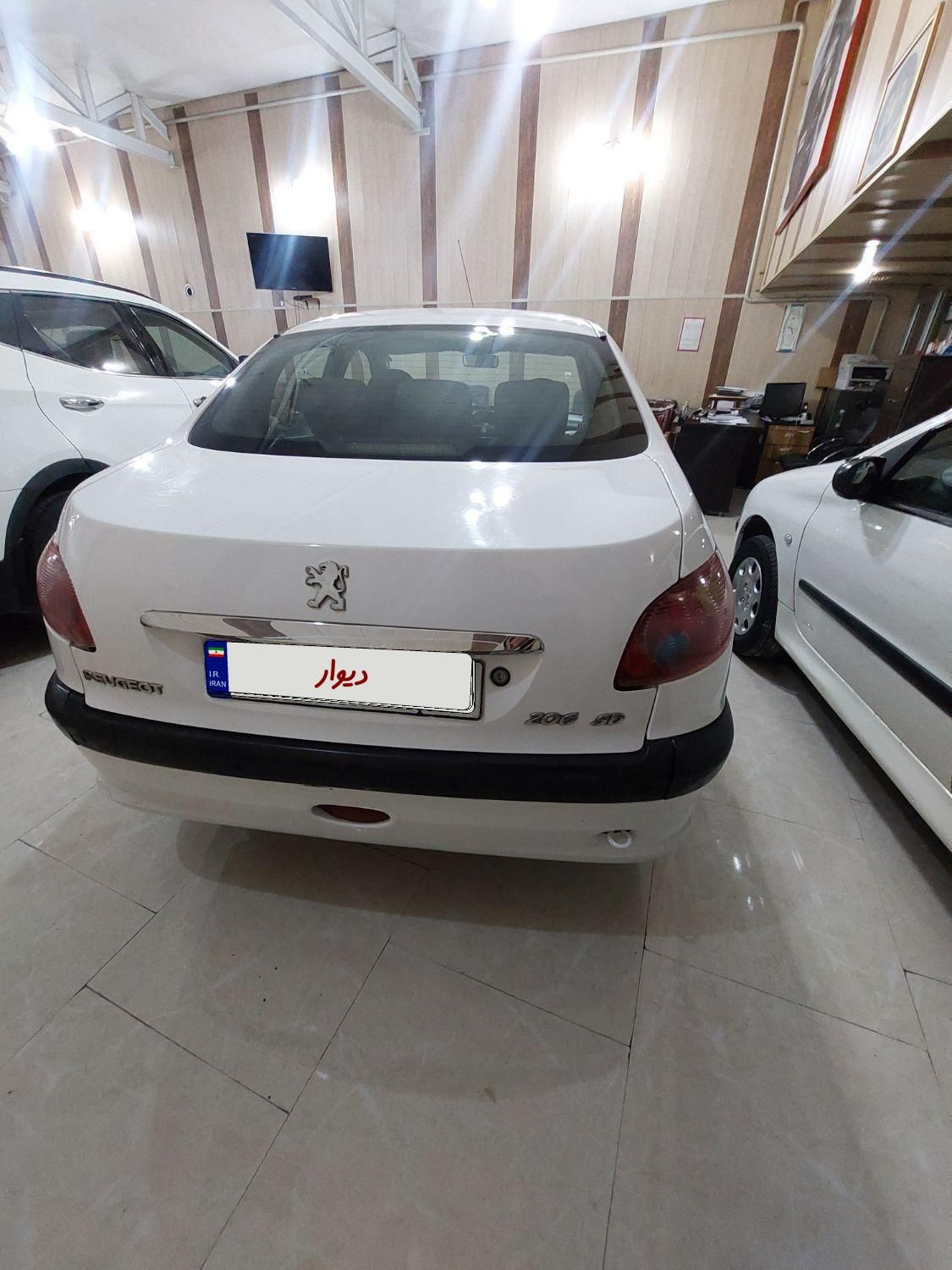 پژو ۲۰۶ صندوق دار v8 - 1391