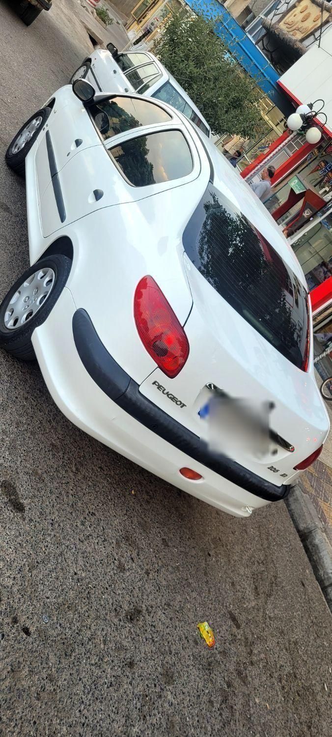 پژو ۲۰۶ صندوق دار v8 - 1394