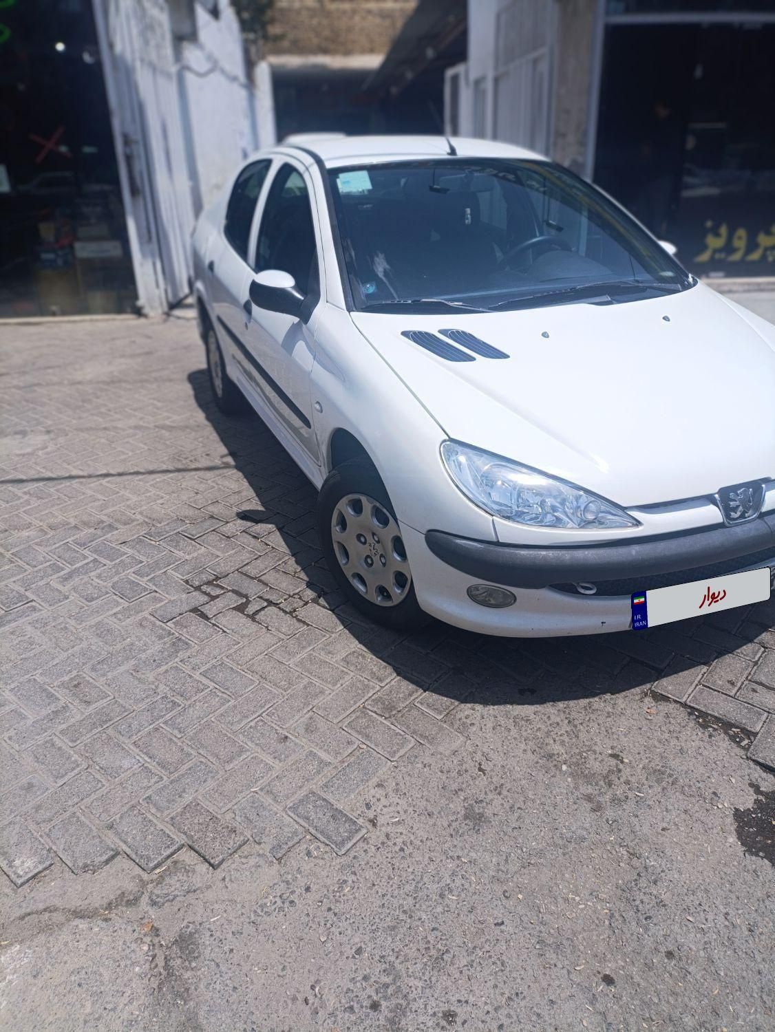 پژو ۲۰۶ صندوق دار v8 - 1396