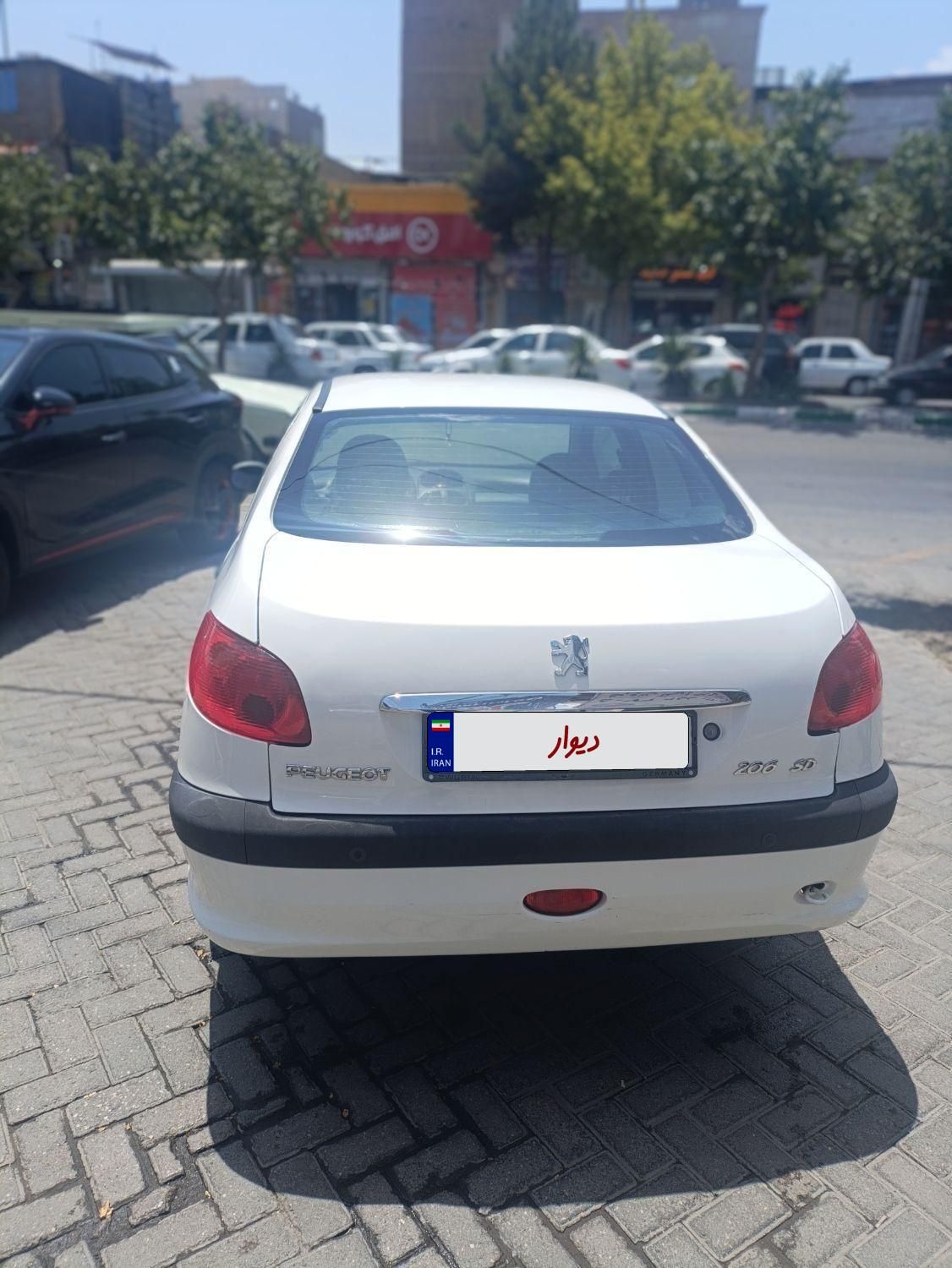 پژو ۲۰۶ صندوق دار v8 - 1396