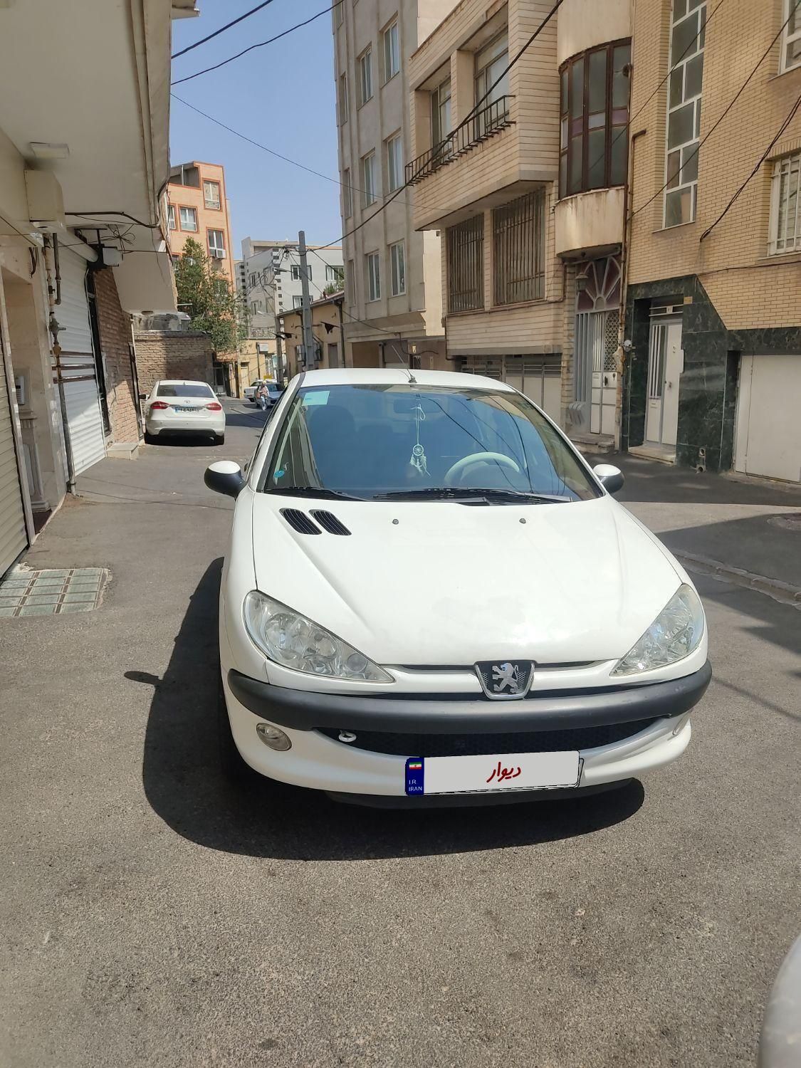 پژو ۲۰۶ صندوق دار v8 - 1397
