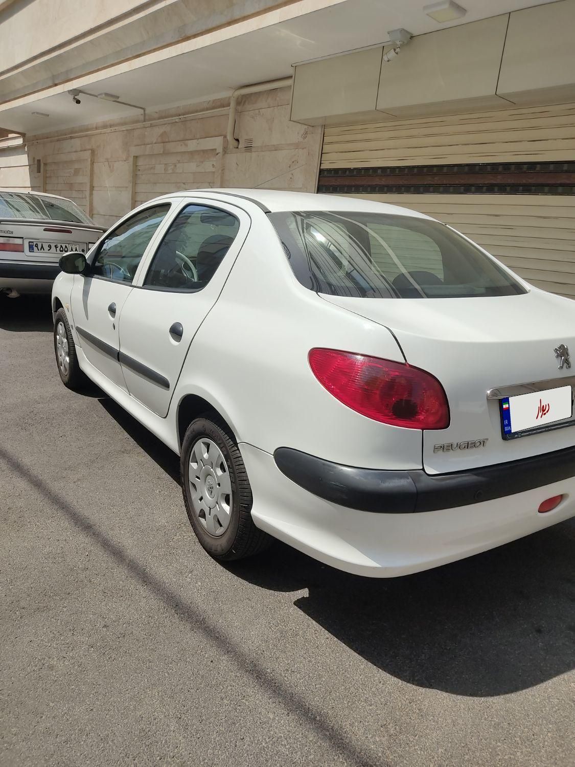 پژو ۲۰۶ صندوق دار v8 - 1397