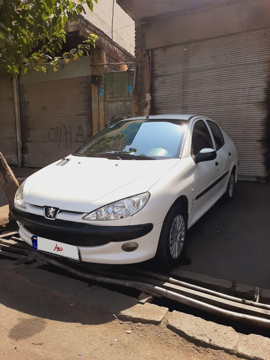 پژو ۲۰۶ صندوق دار v8 - 1396