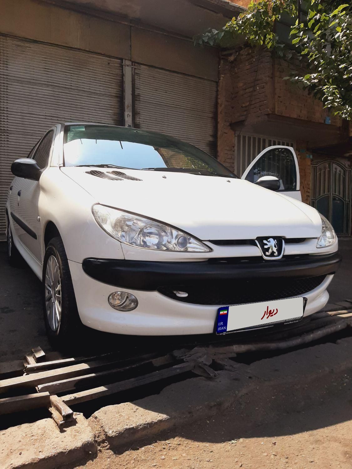 پژو ۲۰۶ صندوق دار v8 - 1396