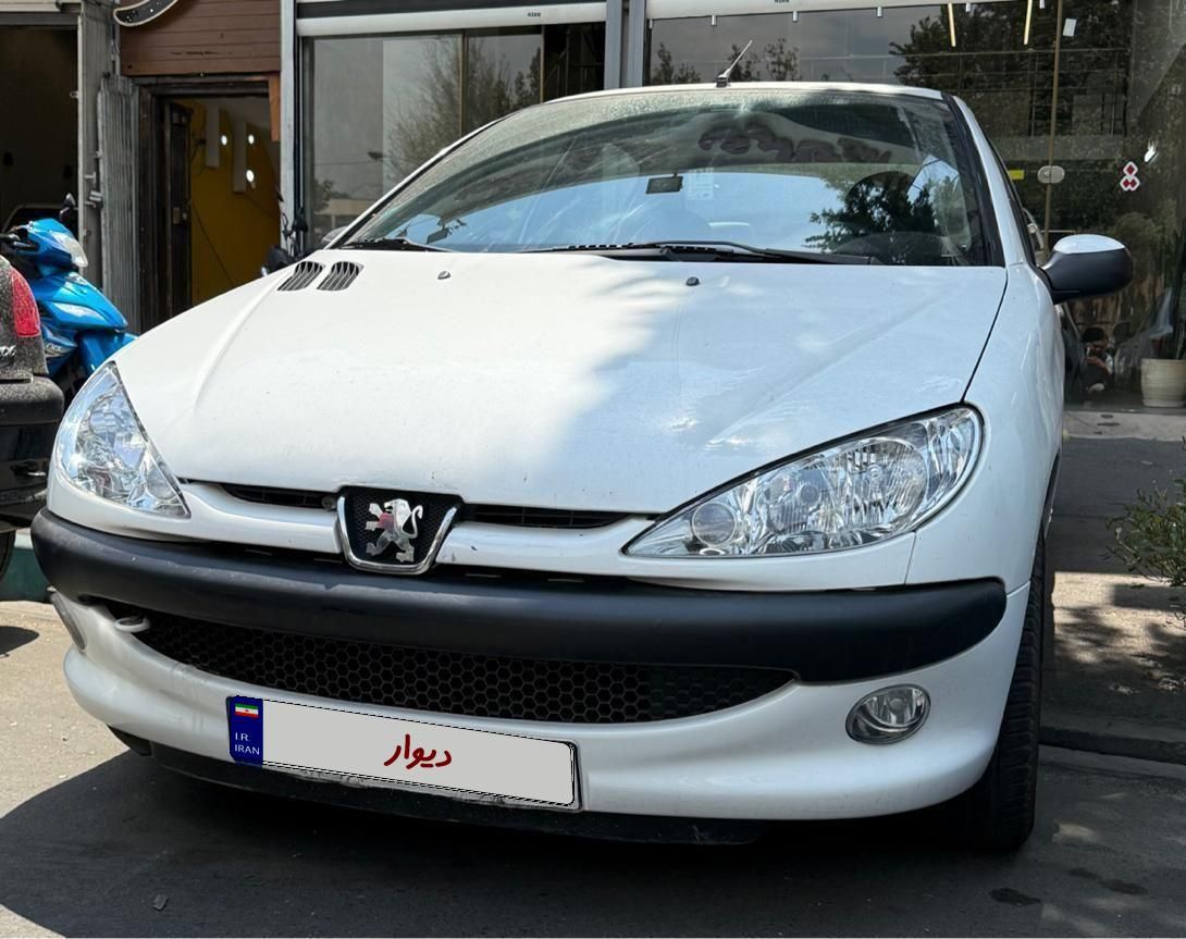پژو ۲۰۶ صندوق دار v8 - 1394