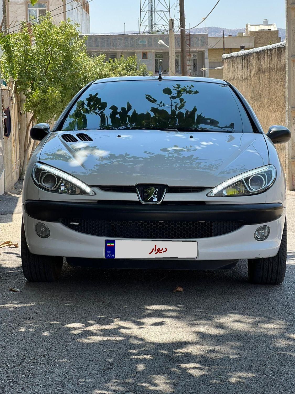 پژو ۲۰۶ صندوق دار v10 - 1390