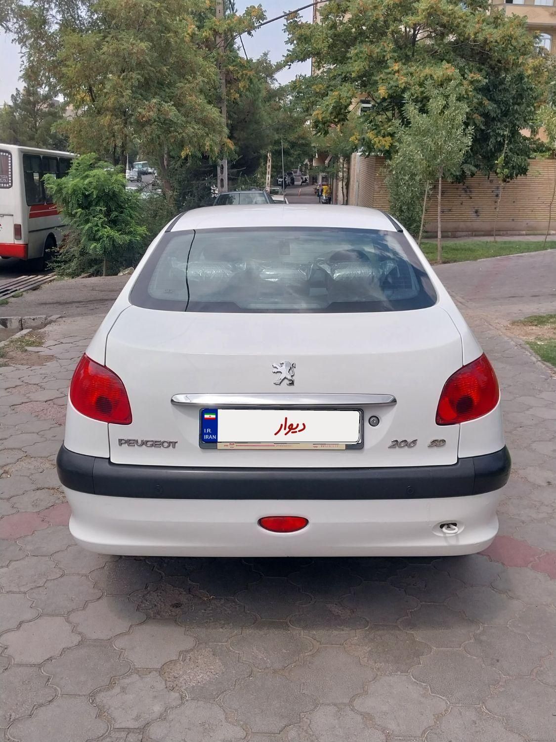 پژو ۲۰۶ صندوق دار v8 - 1397