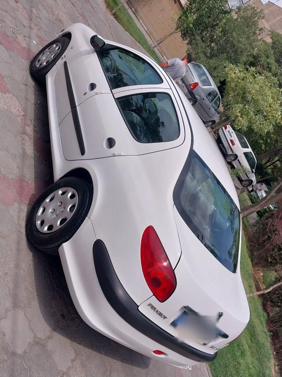 پژو ۲۰۶ صندوق دار v8 - 1397