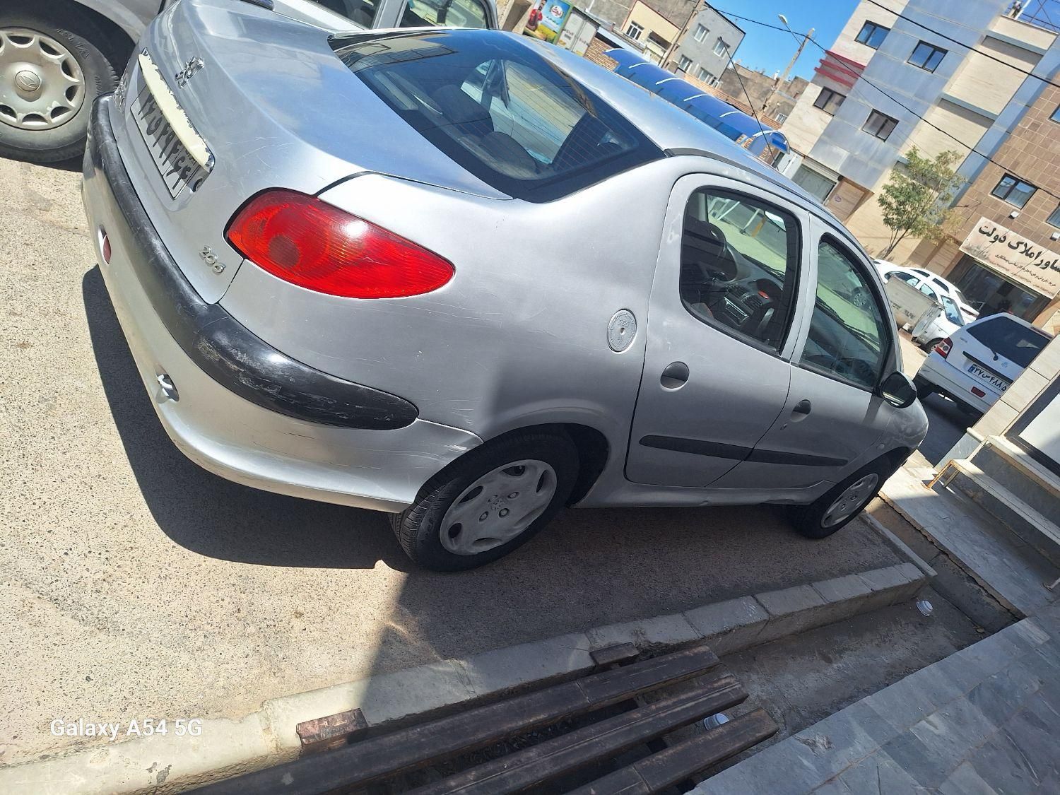 پژو ۲۰۶ صندوق دار v8 - 1385