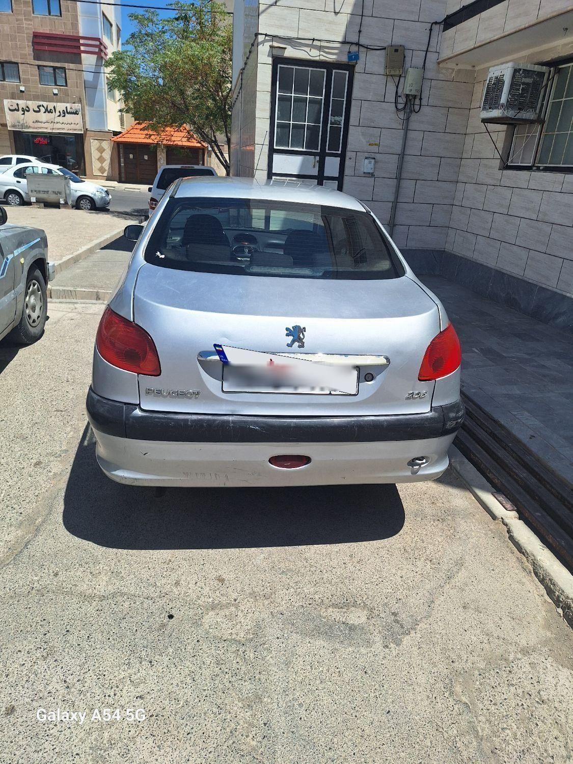 پژو ۲۰۶ صندوق دار v8 - 1385