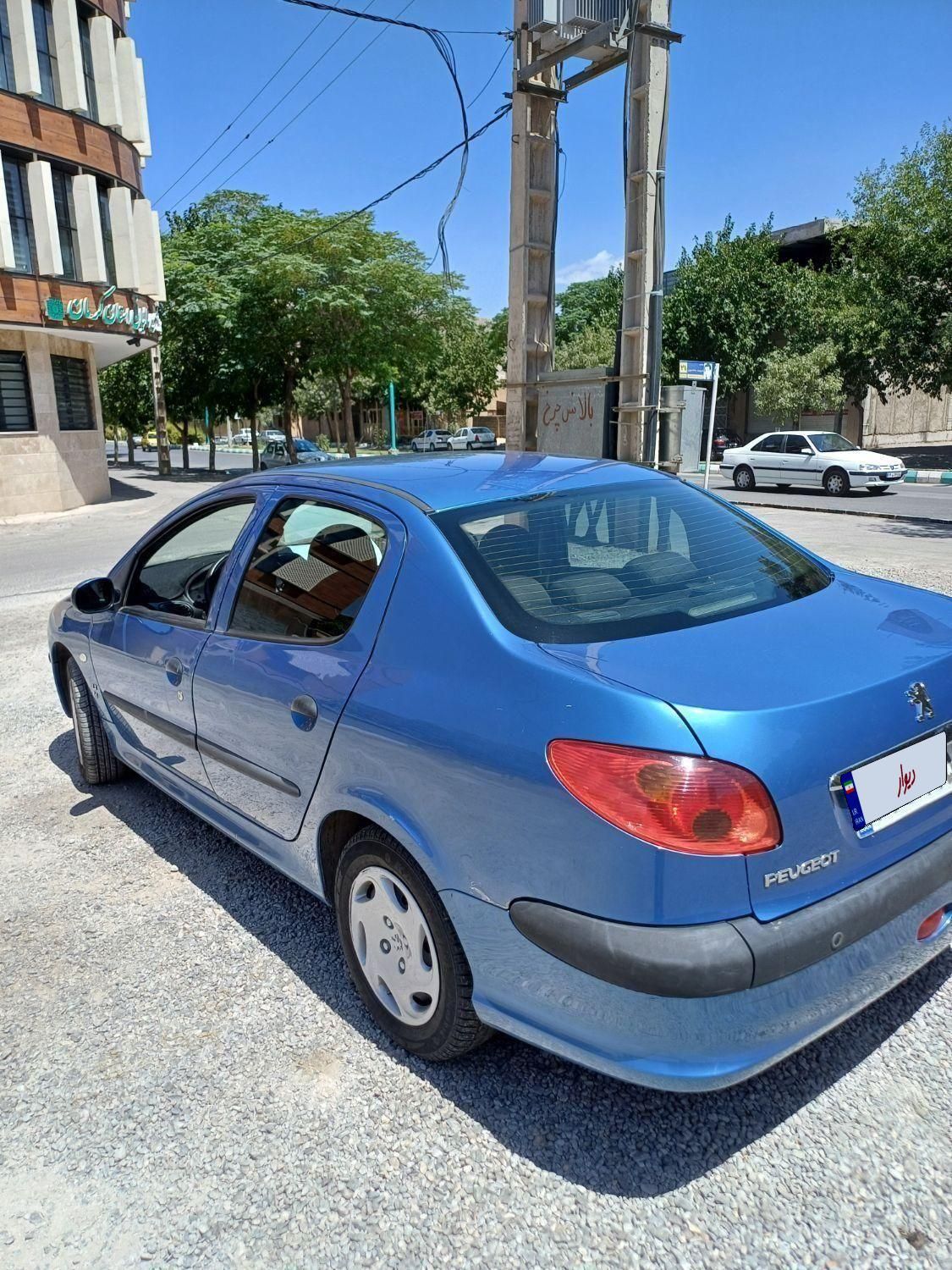 پژو ۲۰۶ صندوق دار v8 - 1395