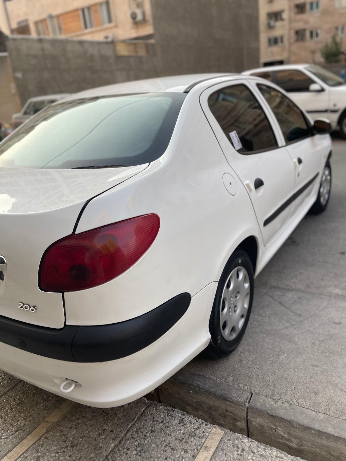 پژو ۲۰۶ صندوق دار v8 - 1396