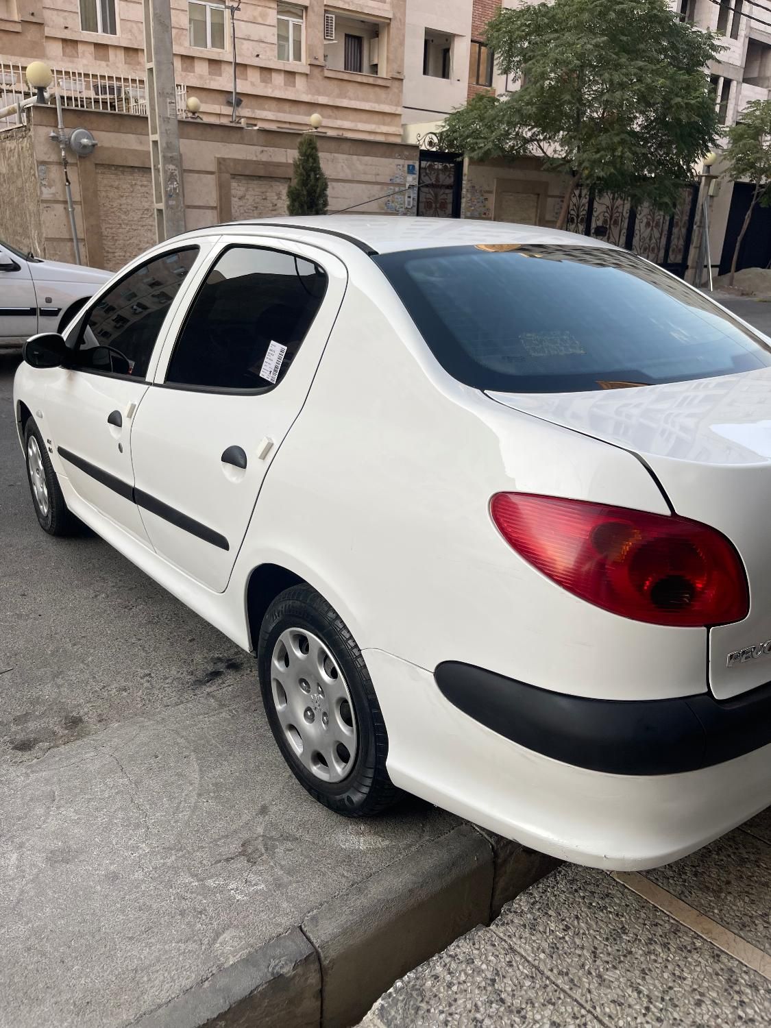 پژو ۲۰۶ صندوق دار v8 - 1396