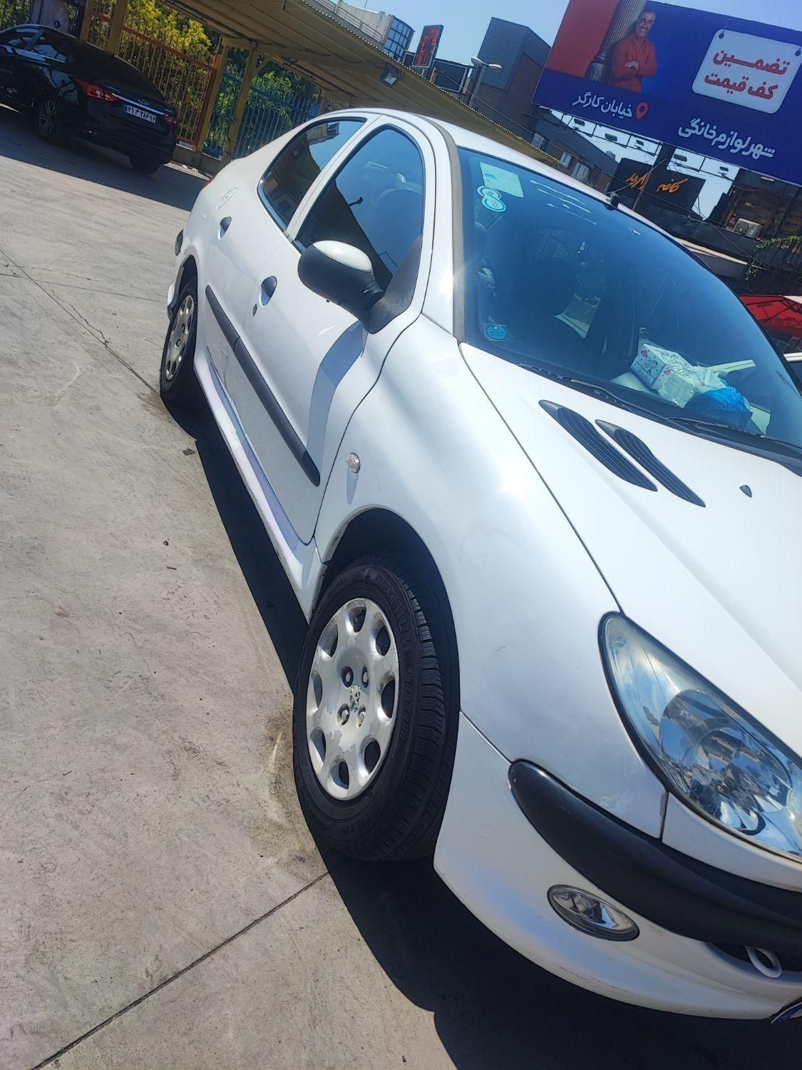 پژو ۲۰۶ صندوق دار v8 - 1395