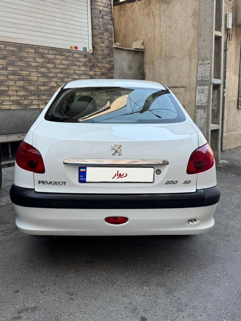 پژو ۲۰۶ صندوق دار v8 - 1396