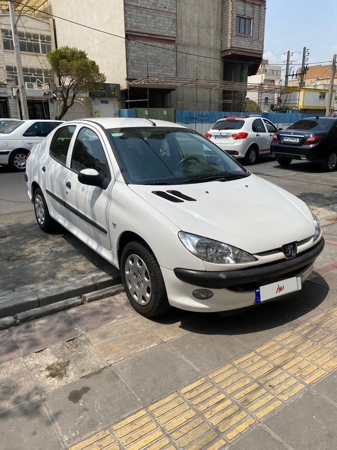 پژو ۲۰۶ صندوق دار v8 - 1394