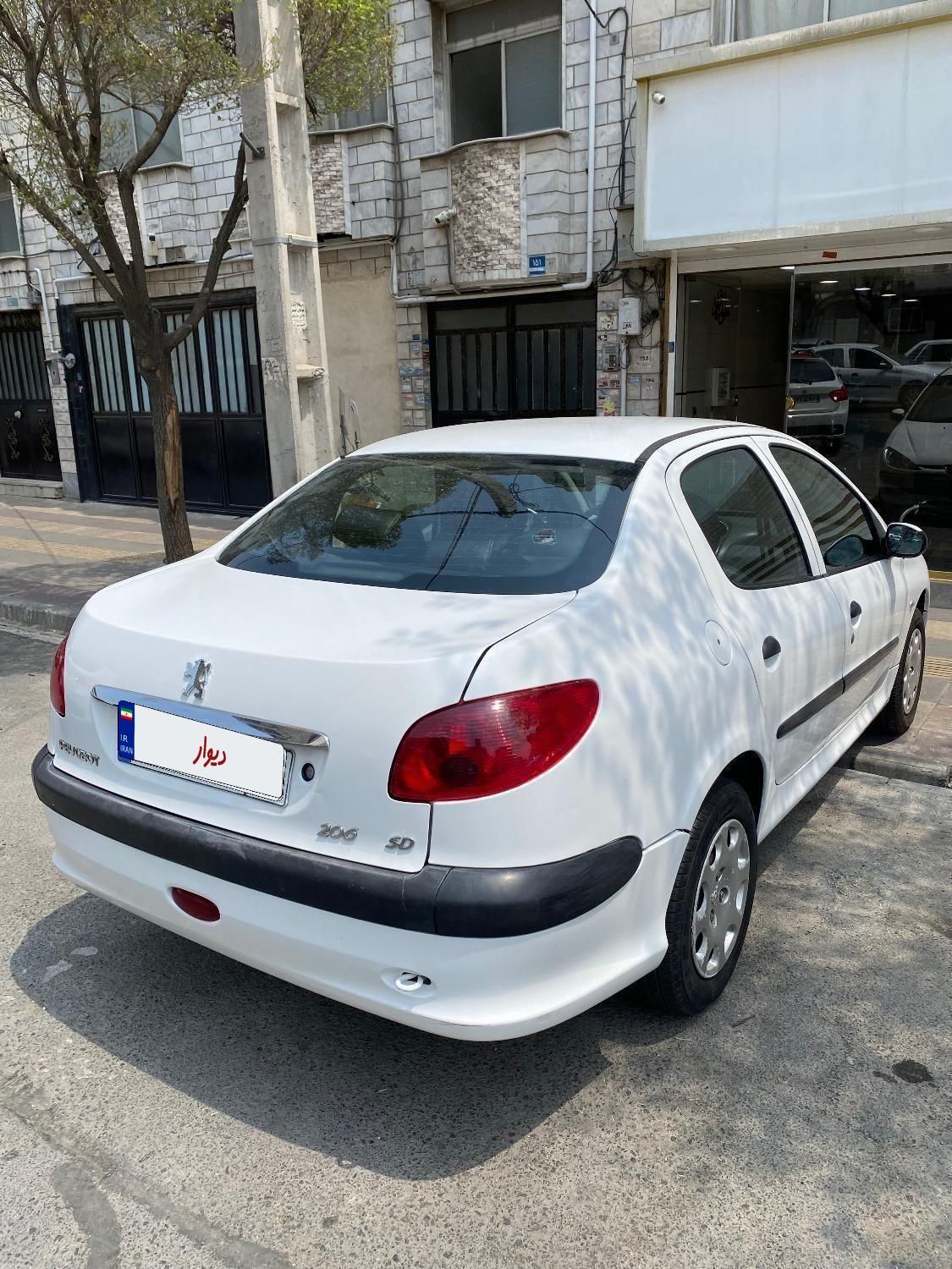 پژو ۲۰۶ صندوق دار v8 - 1394
