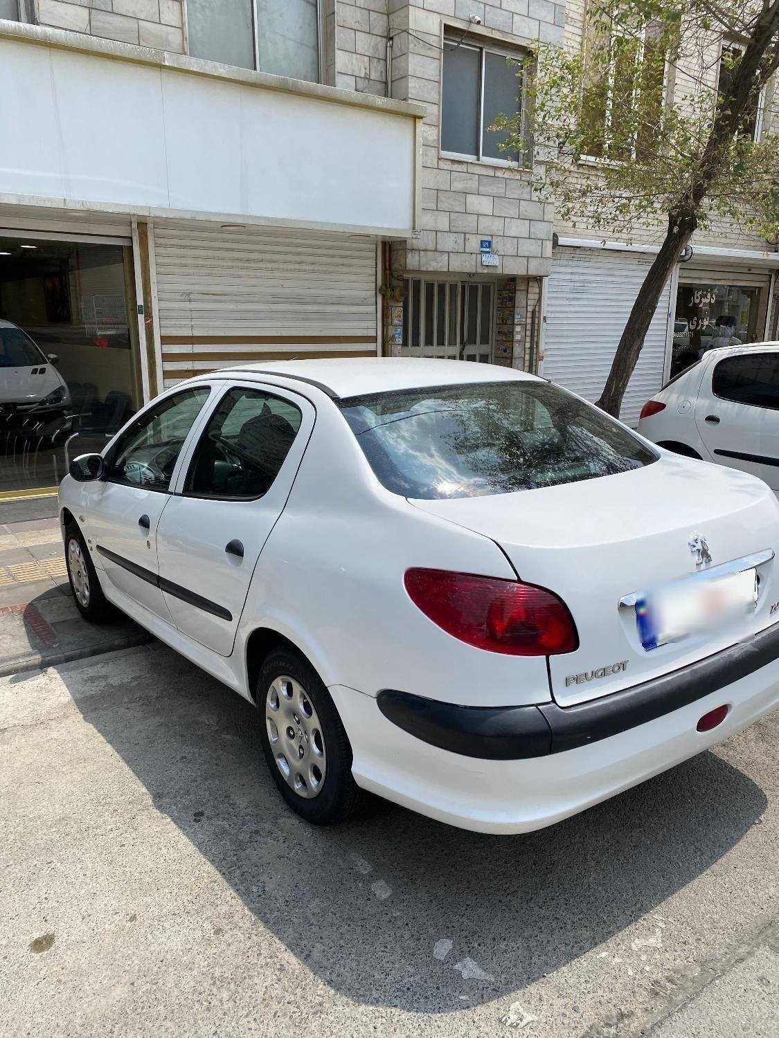 پژو ۲۰۶ صندوق دار v8 - 1394