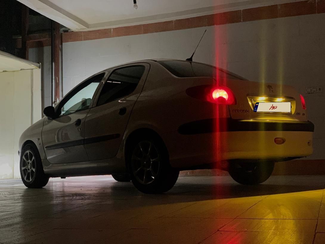 پژو ۲۰۶ صندوق دار v8 - 1394