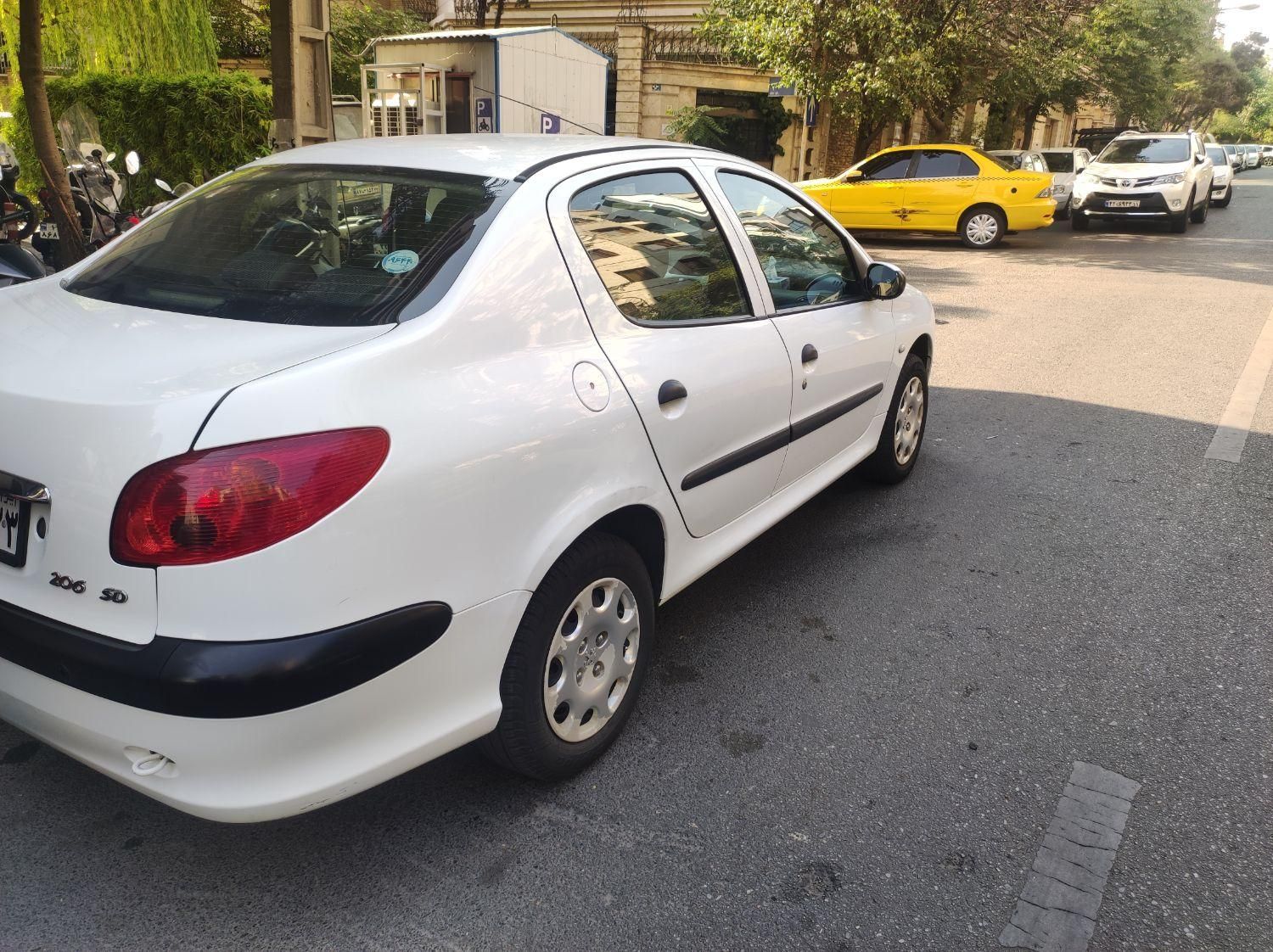 پژو ۲۰۶ صندوق دار v8 - 1394