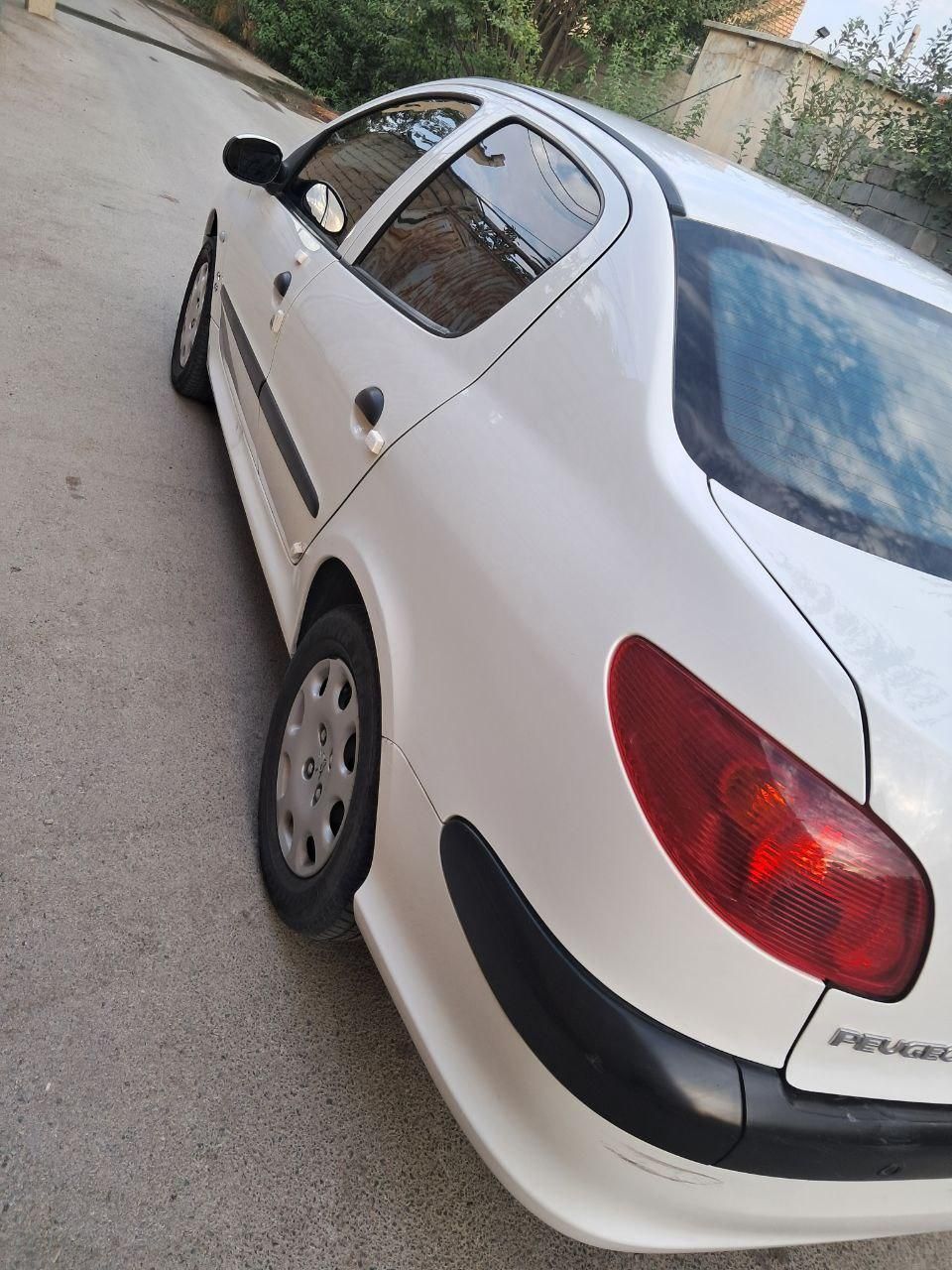پژو ۲۰۶ صندوق دار v8 - 1397