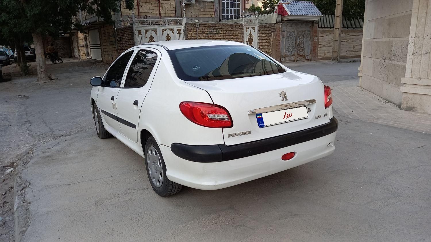 پژو ۲۰۶ صندوق دار v8 - 1397