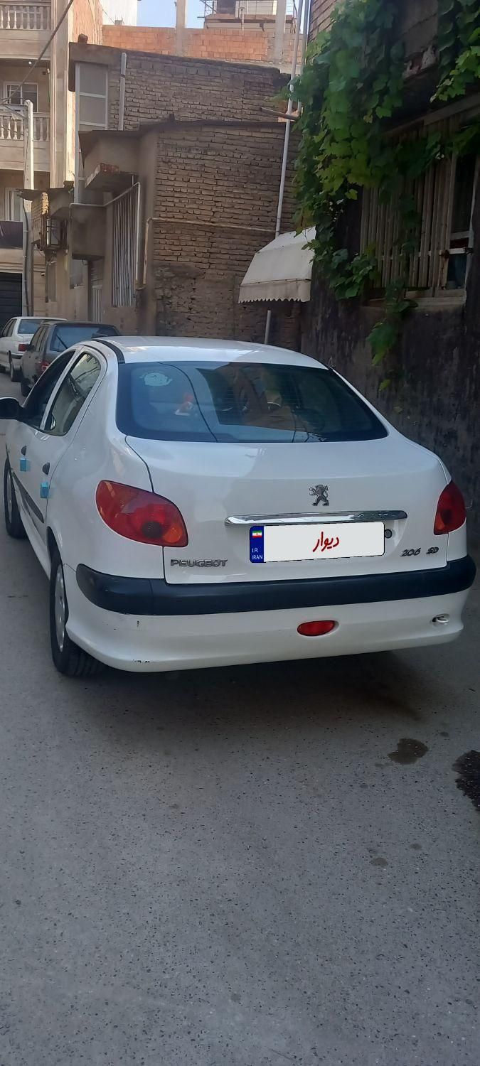 پژو ۲۰۶ صندوق دار v8 - 1395