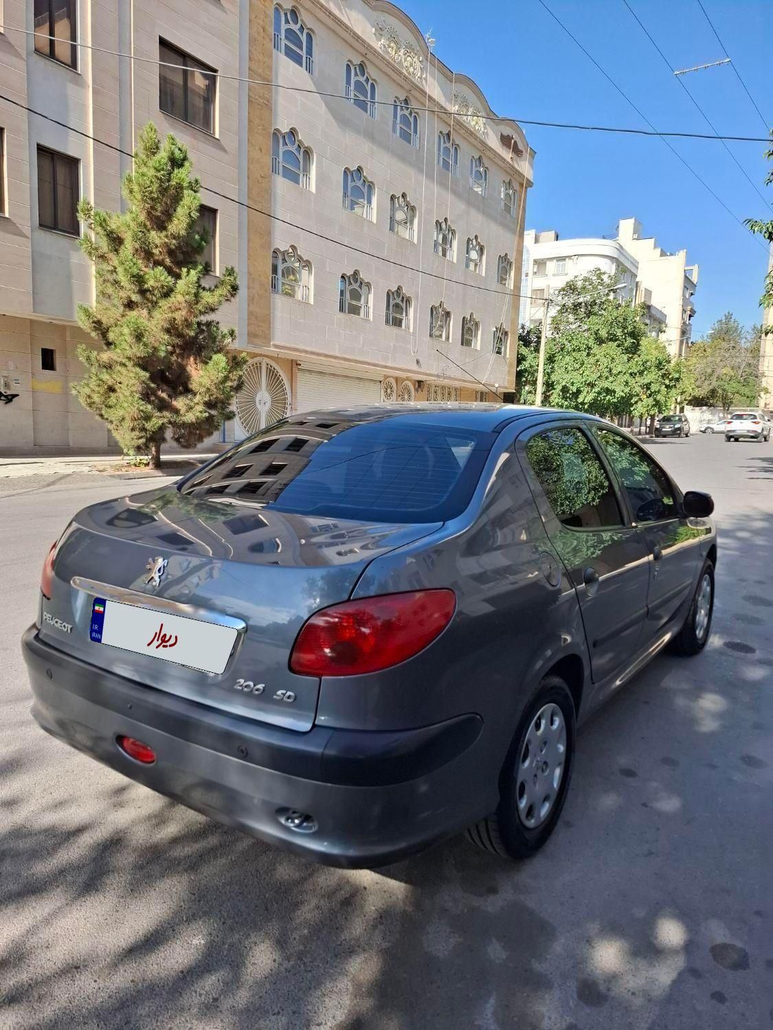پژو ۲۰۶ صندوق دار v8 - 1396