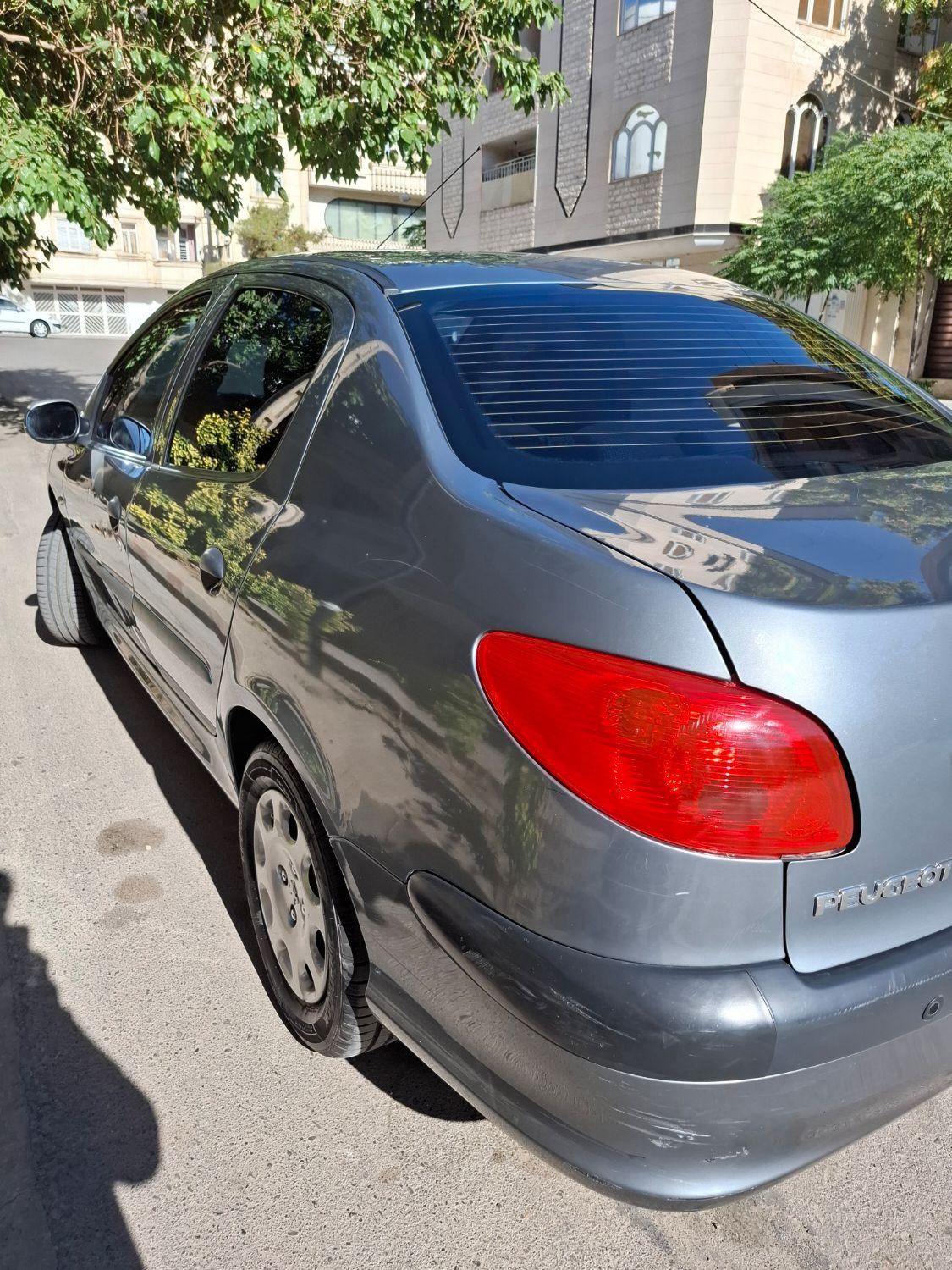 پژو ۲۰۶ صندوق دار v8 - 1396