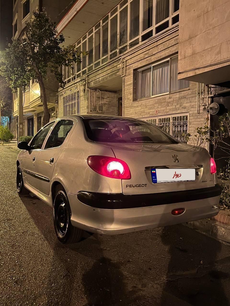 پژو ۲۰۶ صندوق دار v8 - 1394