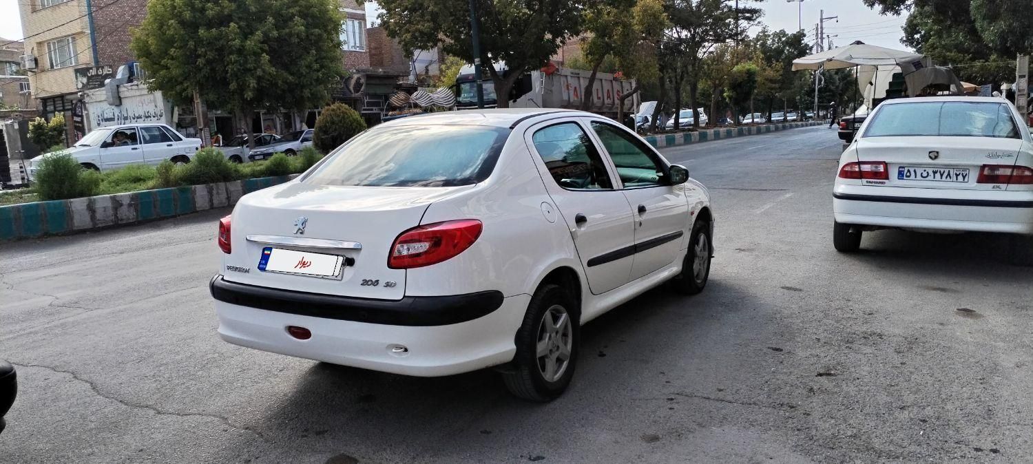 پژو ۲۰۶ صندوق دار v8 - 1393