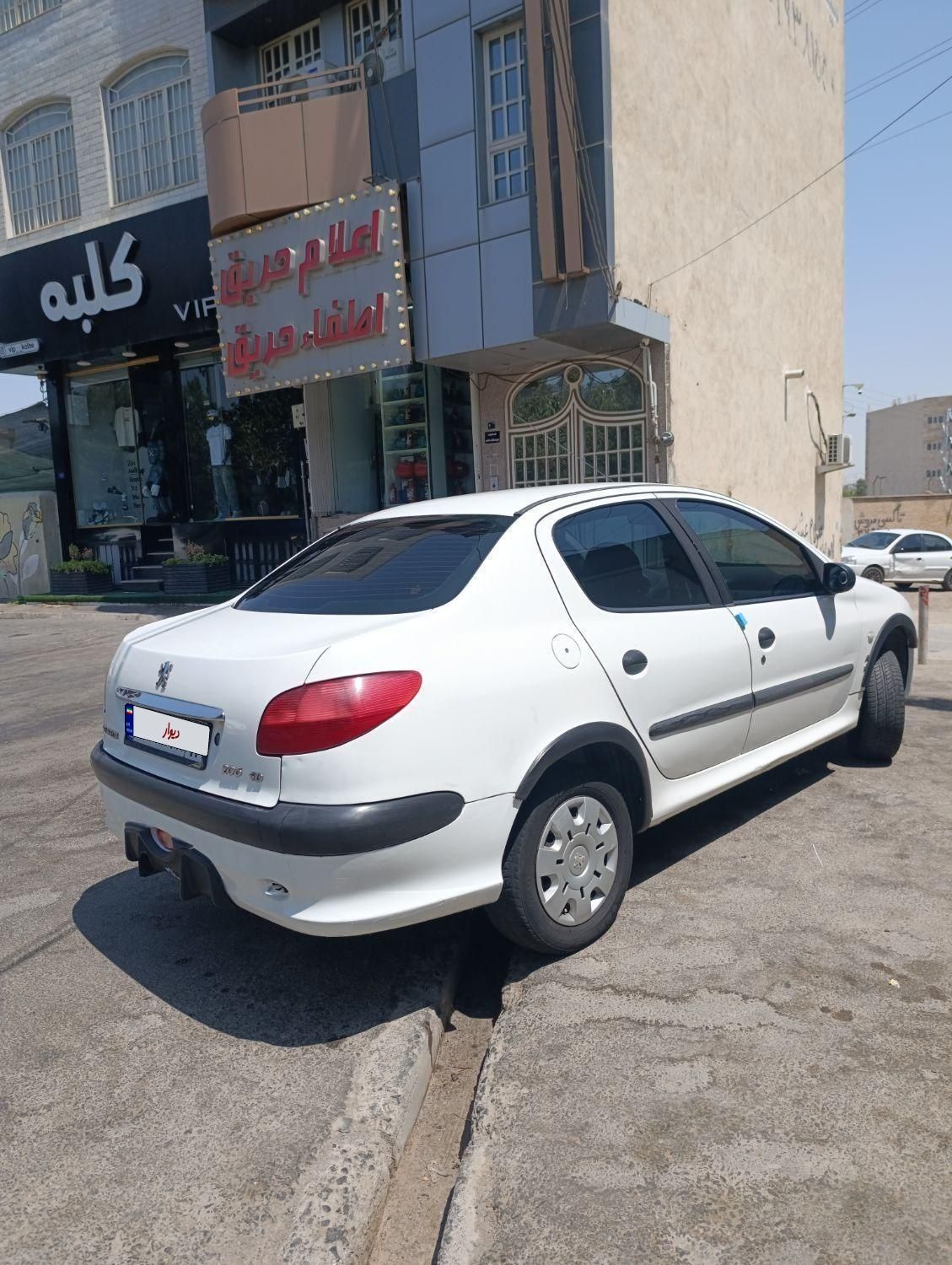 پژو ۲۰۶ صندوق دار v6 - 1389
