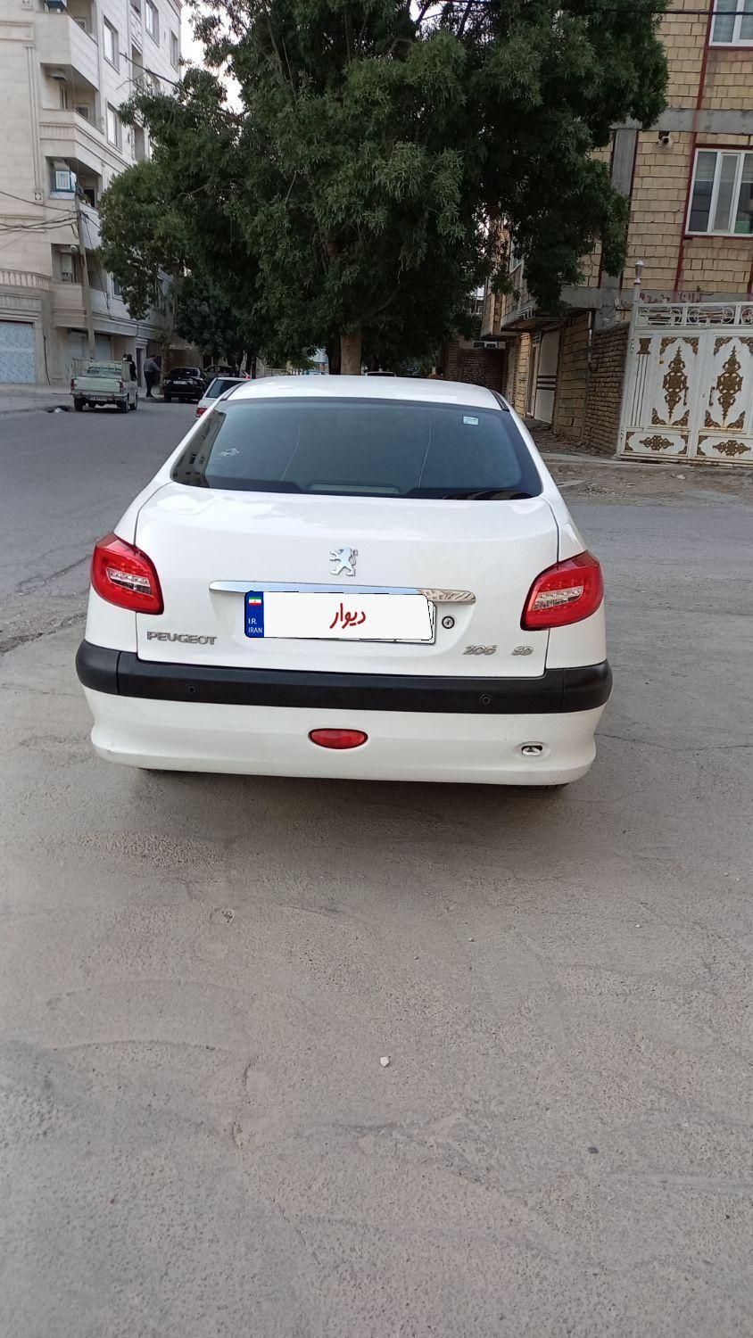 پژو ۲۰۶ صندوق دار v8 - 1397