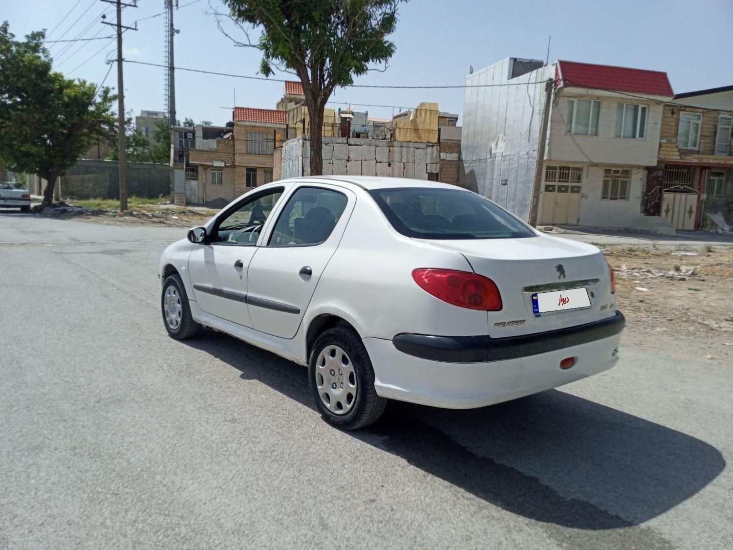 پژو ۲۰۶ صندوق دار v10 - 1390