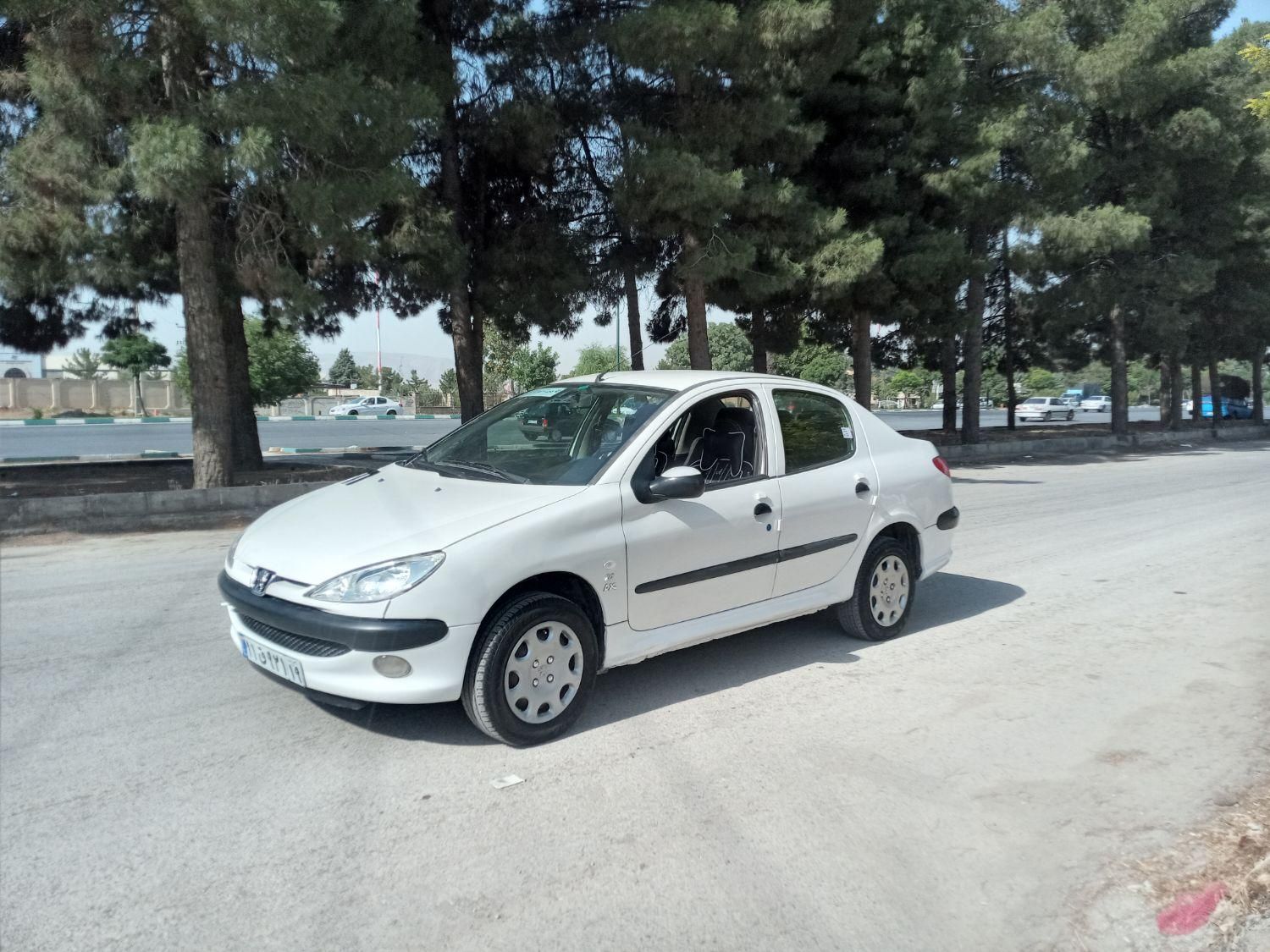 پژو ۲۰۶ صندوق دار v10 - 1390