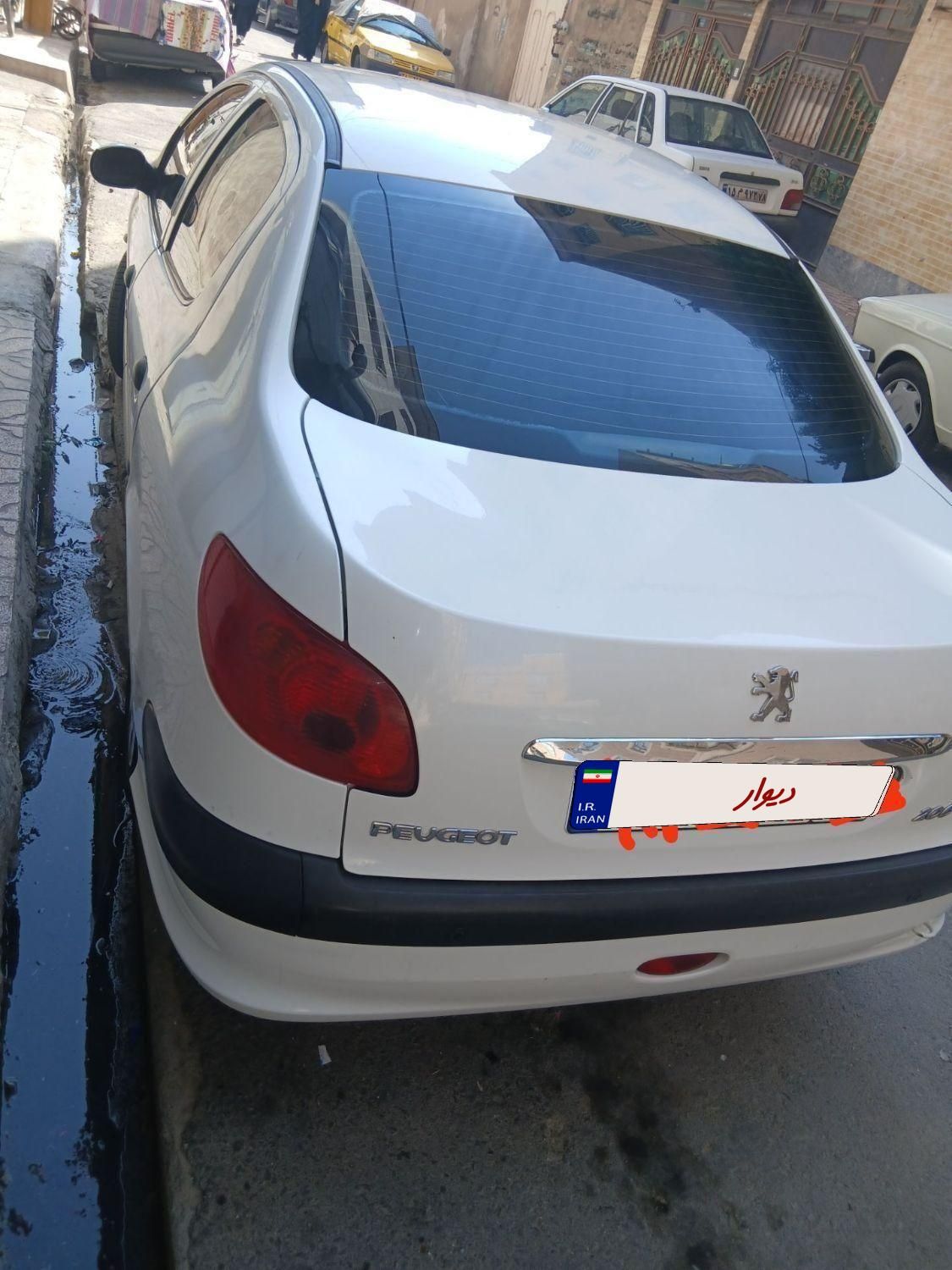 پژو ۲۰۶ صندوق دار v8 - 1394