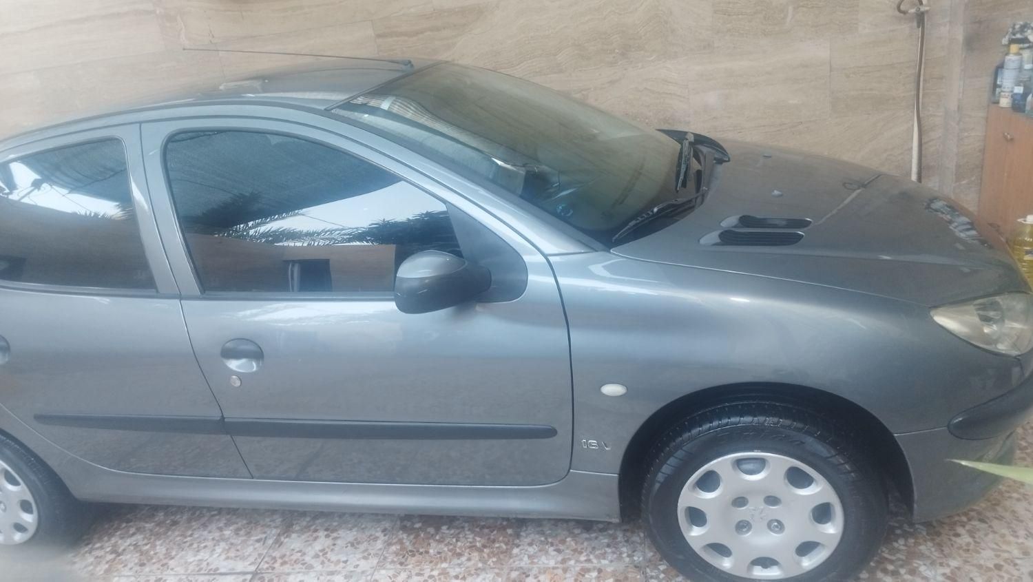 پژو ۲۰۶ صندوق دار v8 - 1397
