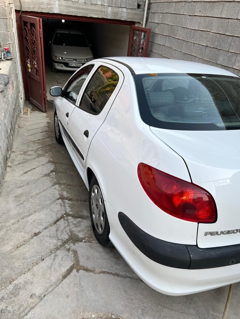 پژو ۲۰۶ صندوق دار v8 - 1397