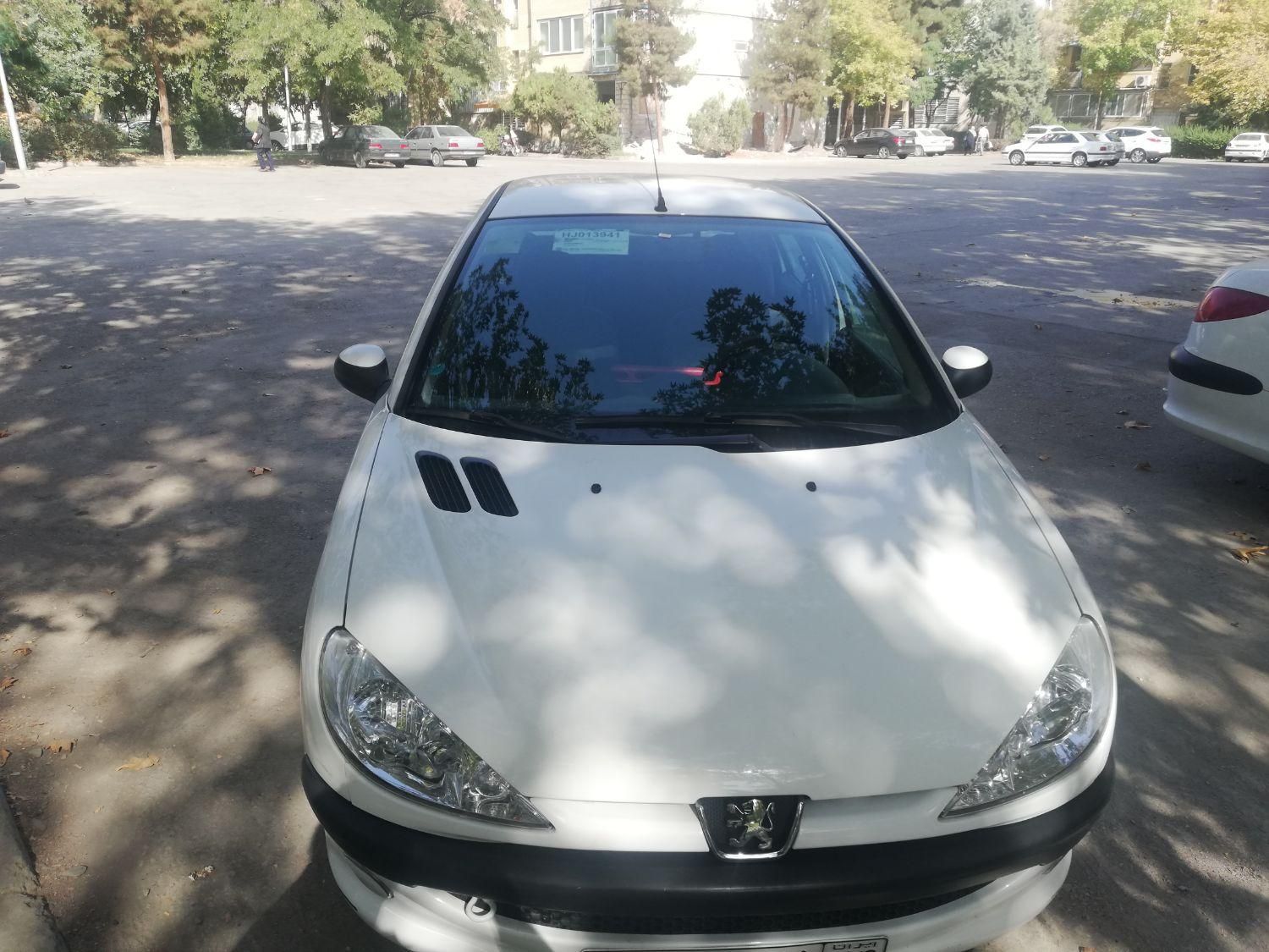 پژو ۲۰۶ صندوق دار v8 - 1396