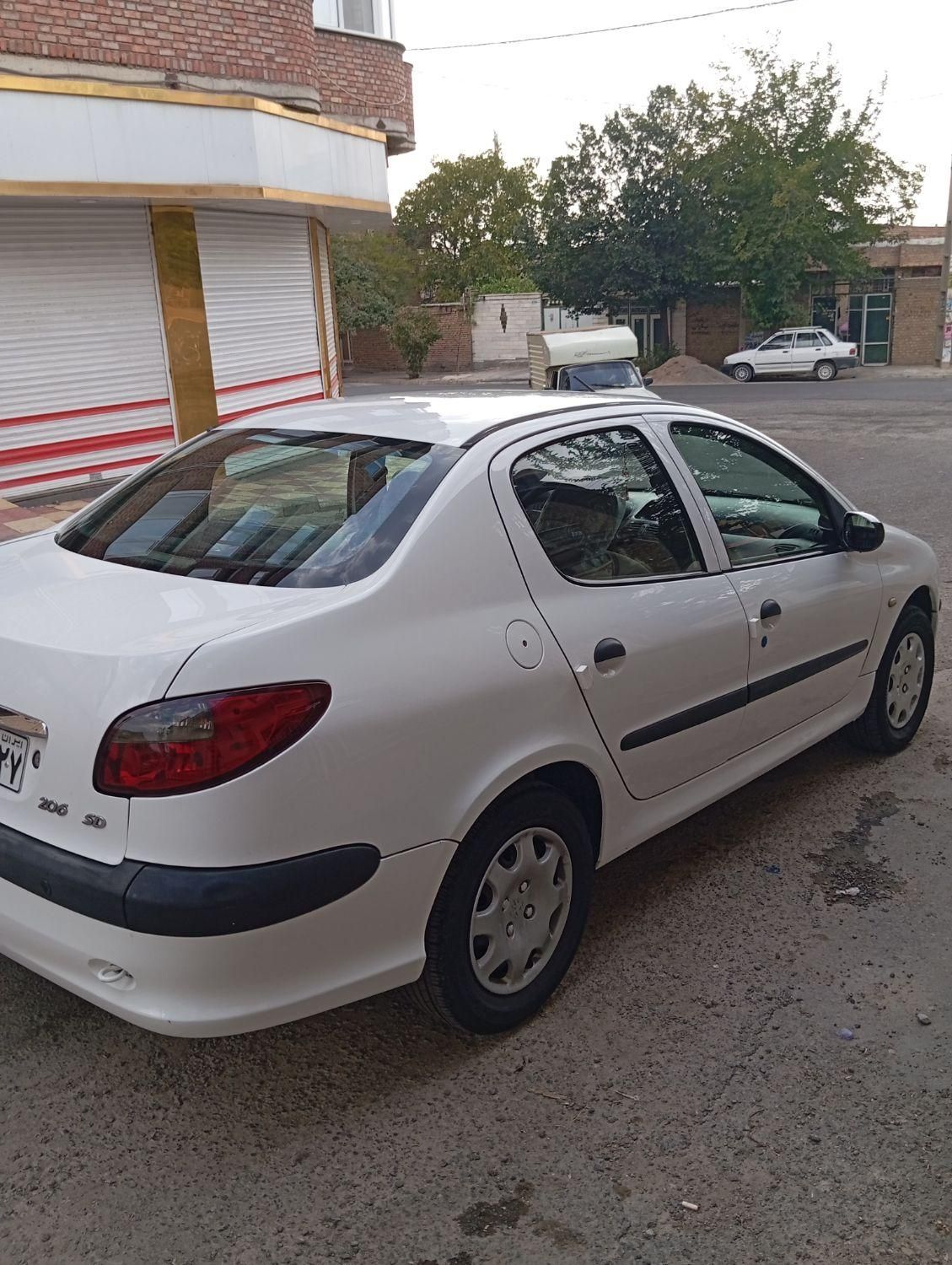 پژو ۲۰۶ صندوق دار v8 - 1393