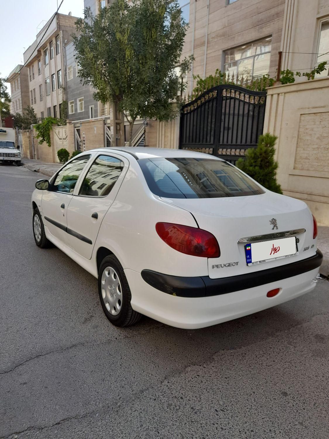 پژو ۲۰۶ صندوق دار v8 - 1391