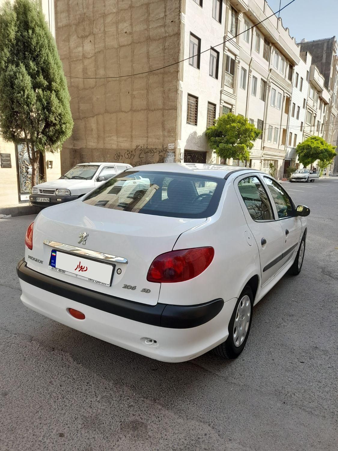 پژو ۲۰۶ صندوق دار v8 - 1391