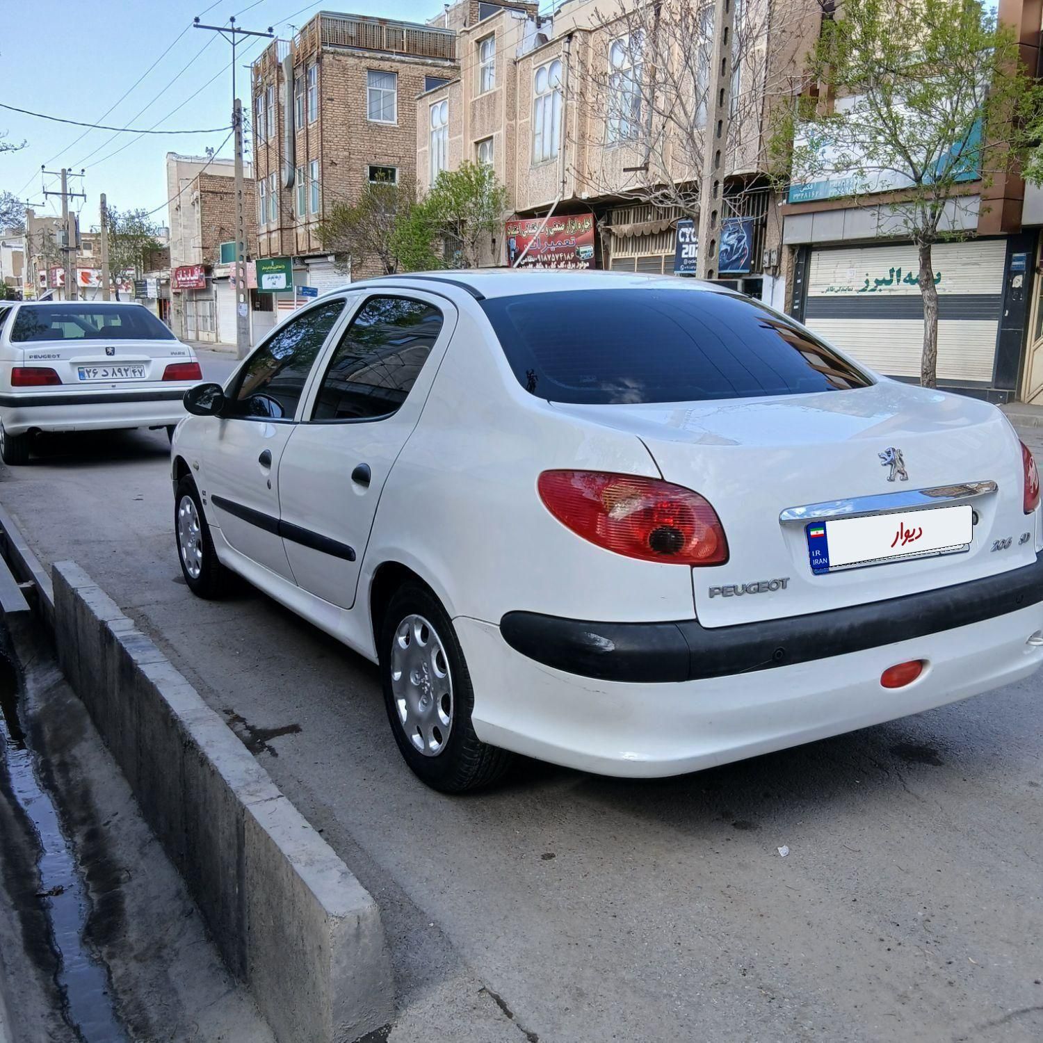 پژو ۲۰۶ صندوق دار v8 - 1394