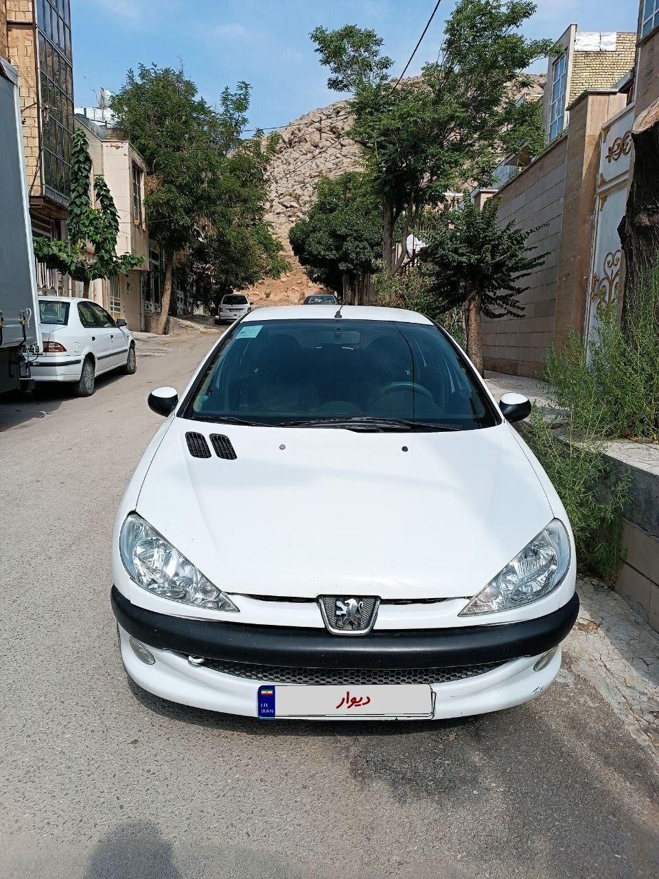 پژو ۲۰۶ صندوق دار v8 - 1396
