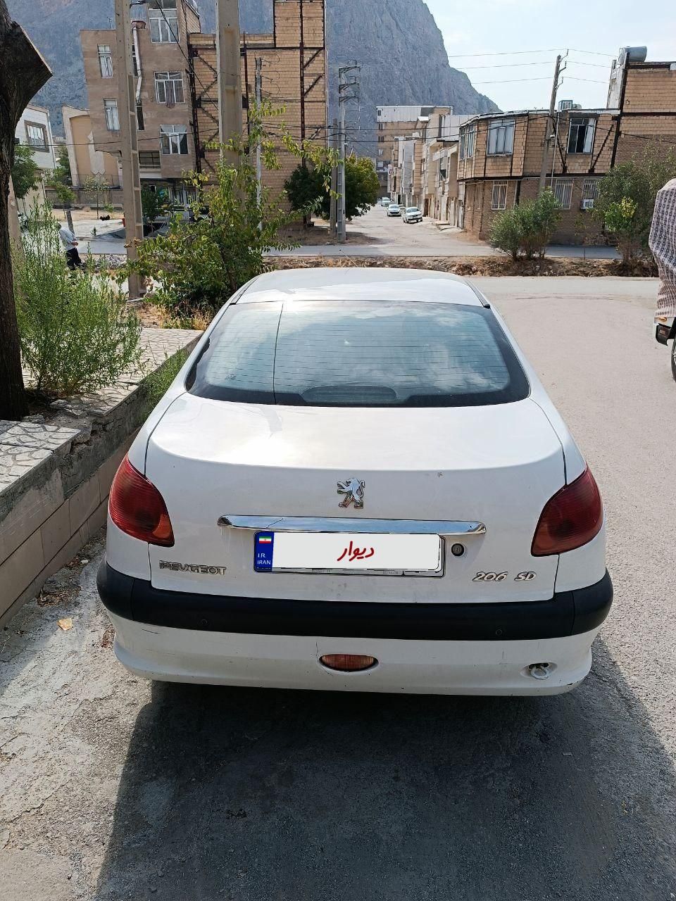 پژو ۲۰۶ صندوق دار v8 - 1396