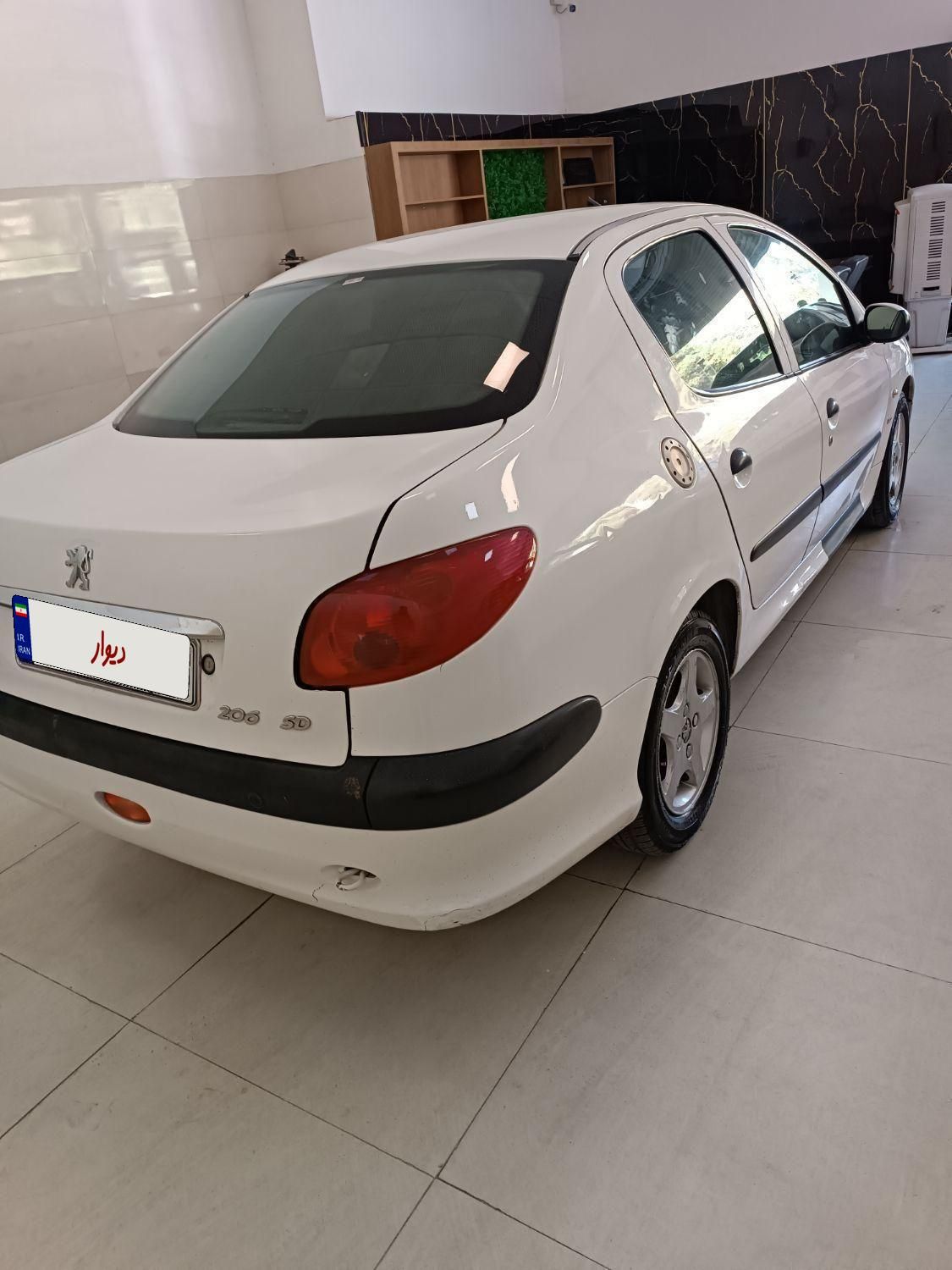پژو ۲۰۶ صندوق دار v8 - 1393