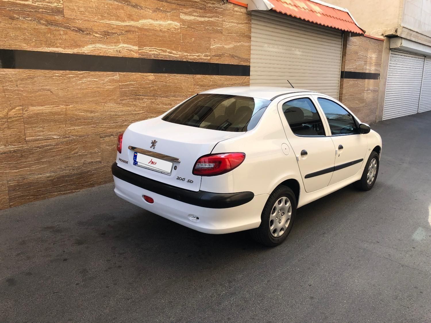 پژو ۲۰۶ صندوق دار v8 - 1395