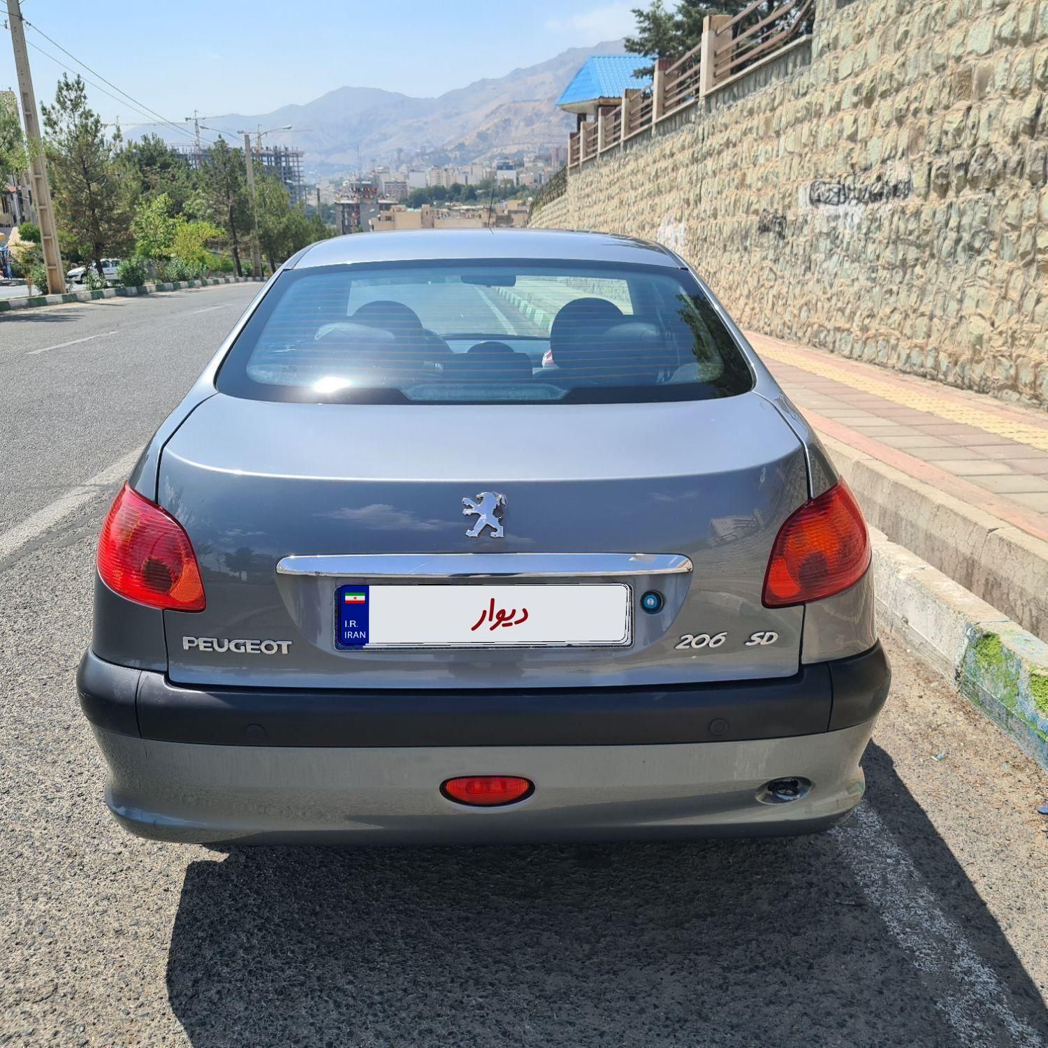 پژو ۲۰۶ صندوق دار v8 - 1397